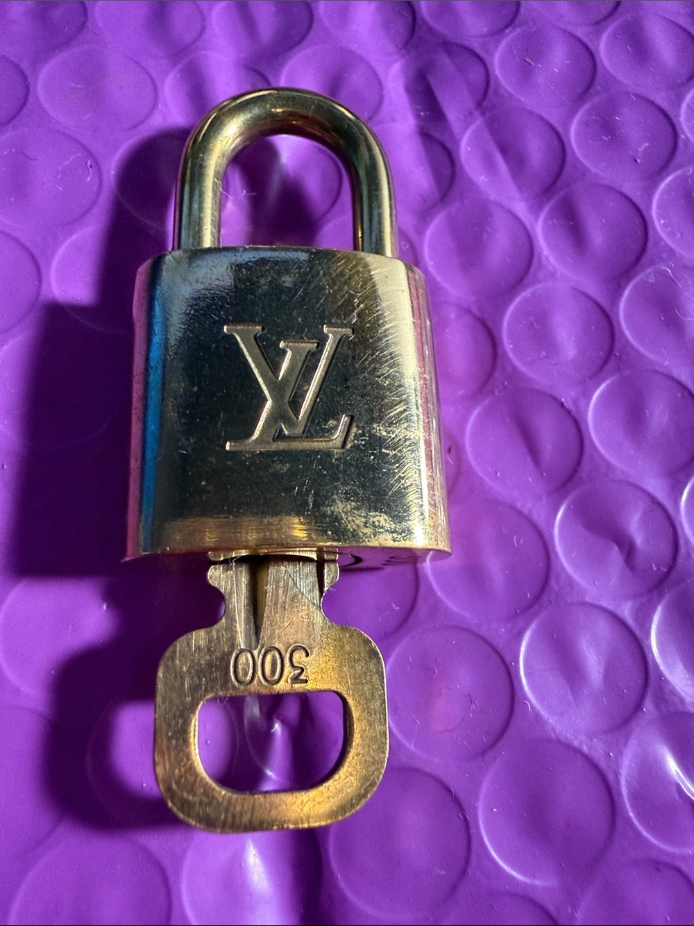 Louis Vuitton Gold Tone Padlock with Key